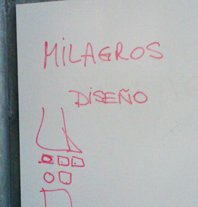 Milagros on white board